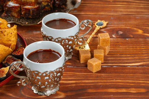 Two cups of coffee with traditional turkish desserts — Stock Photo, Image