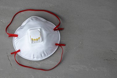 Kirliliğe ve enfeksiyonlara karşı koruyucu tıbbi yüz maskesi