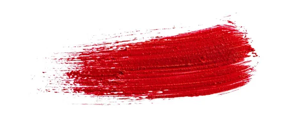 Muestra de mancha de un lápiz labial rojo mate sobre fondo blanco — Foto de Stock
