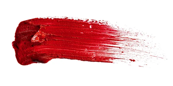 Stain swatch of a red matte lipstick on white background — Stock Photo, Image