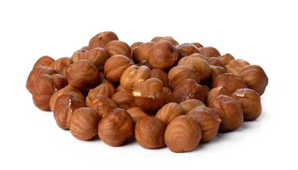 Heap of raw hazelnuts isolated on white — Stock Photo, Image