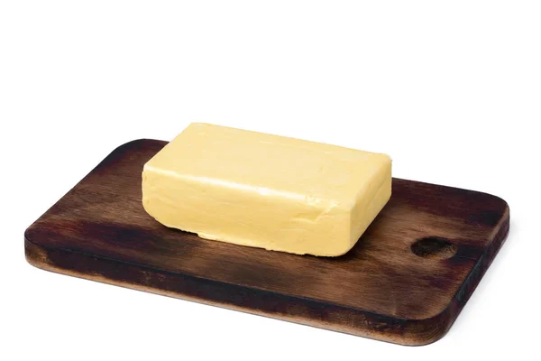 A cake sitting on top of a wooden table — Stock Photo, Image