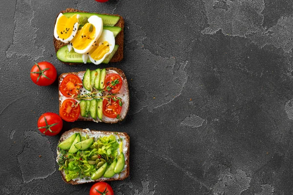 Menú de fondo con variedad de diferentes sándwiches veganos — Foto de Stock