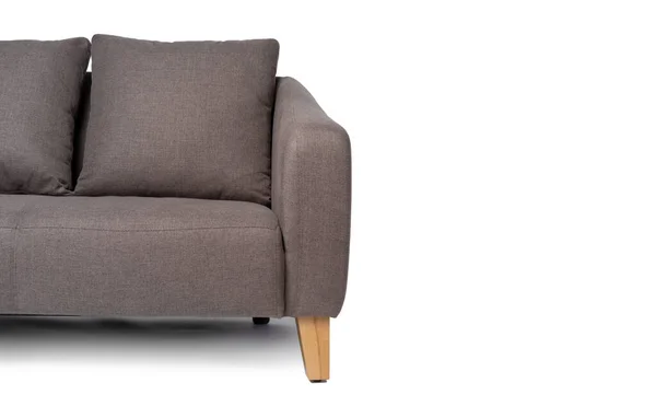 柔らかい灰色のソファ上の白い背景クローズアップ — ストック写真