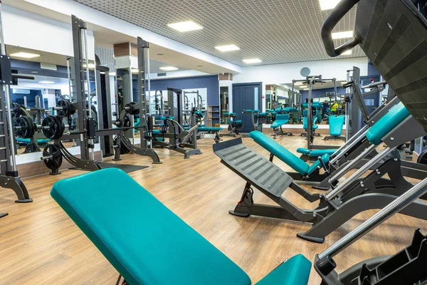 New sports equipment in a gym, nobody — Stock Photo, Image