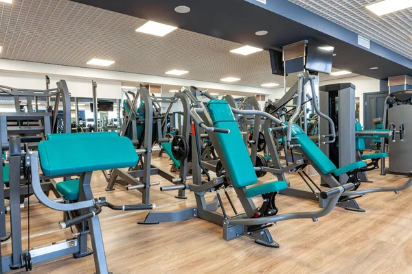 New sports equipment in a gym, nobody — Stock Photo, Image