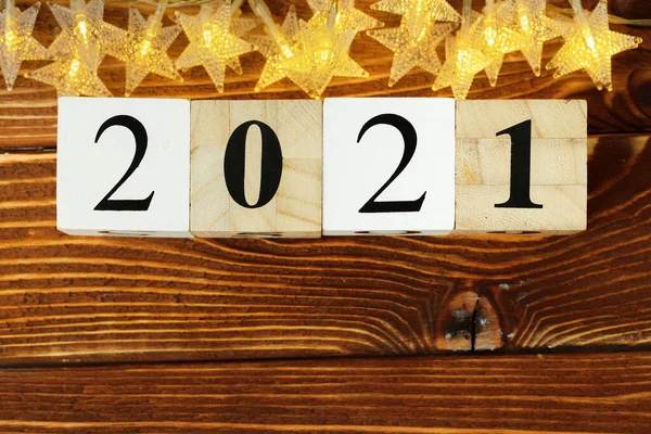Concept of the year 2021. Golden stars with 2021 numbers on paper background — Stock Photo, Image