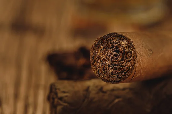 Pile of new cigars close up on wooden table — Stock Photo, Image