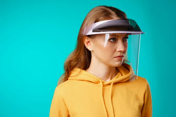 Young woman wearing medical protective face shield — Stock Photo, Image