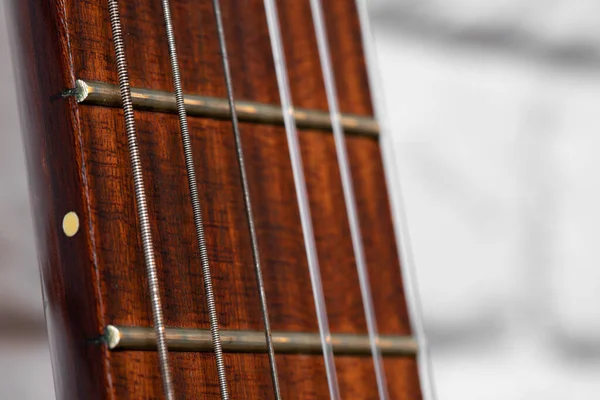 Kytara hmatník s provázky close up fotografie — Stock fotografie