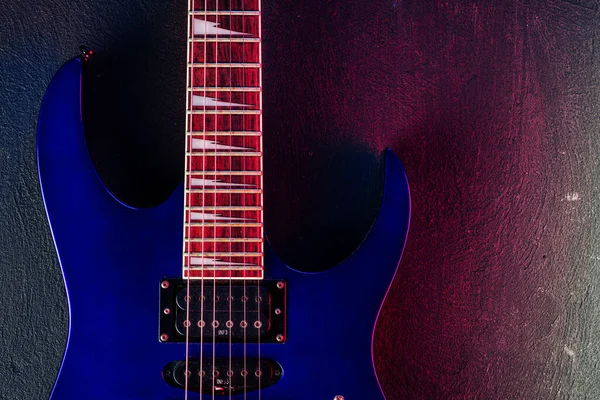 Electric guitar body in the dark close up — Stock Photo, Image