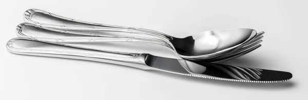 Spoon, fork and knife on a white background — Stock Photo, Image