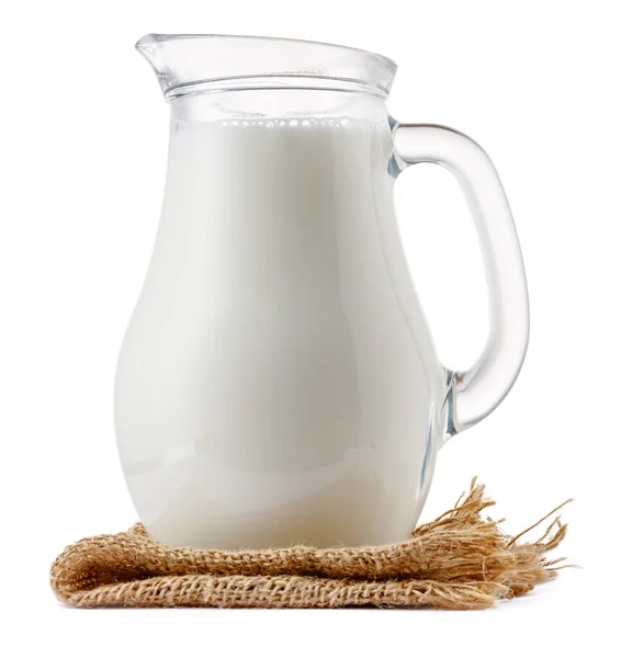 Tarro de leche de vidrio aislado sobre fondo blanco — Foto de Stock