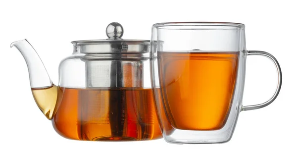Скляний чайник і скляна чашка з чаєм ізольовані на білому — стокове фото