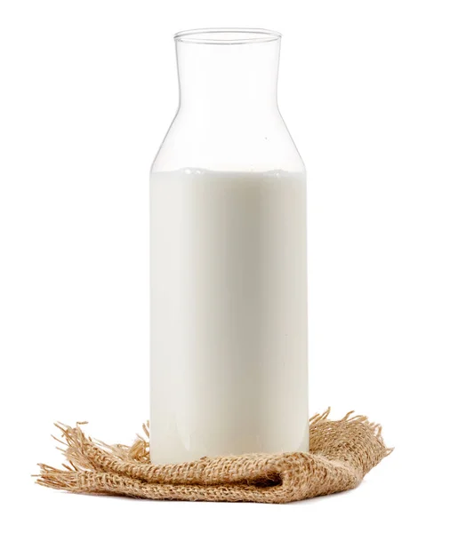 Offene Glasflasche Milch isoliert auf weiß — Stockfoto