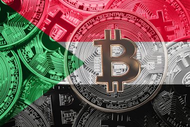 Bitcoin Sudan bayrağı yığını. Bitcoin cryptocurrencies kavramı. BTC arka plan.
