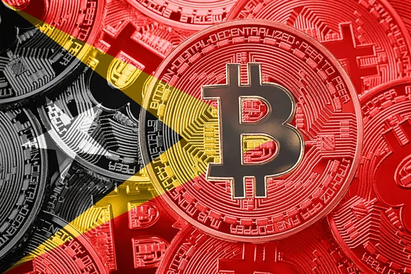 Bitcoin Doğu Timor bayrağı yığını. Bitcoin cryptocurrencies kavramı. BTC arka plan.
