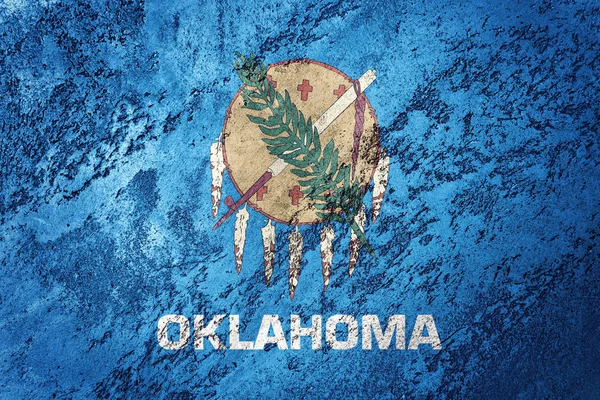 Grunge Oklahoma state flag. Oklahoma flag background grunge texture