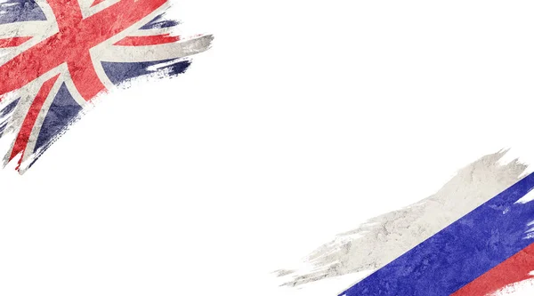 白い背景のイギリスおよびロシアの国旗 — ストック写真