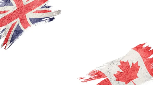 白い背景のイギリスおよびカナダの国旗 — ストック写真
