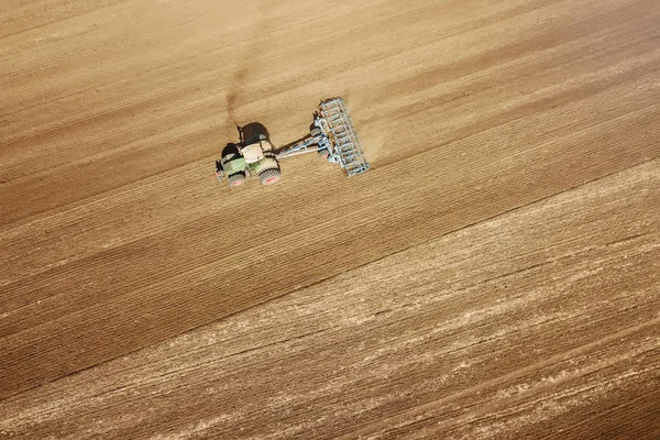 Aerial view Tractor preparing field, Agriculture tractor landscape