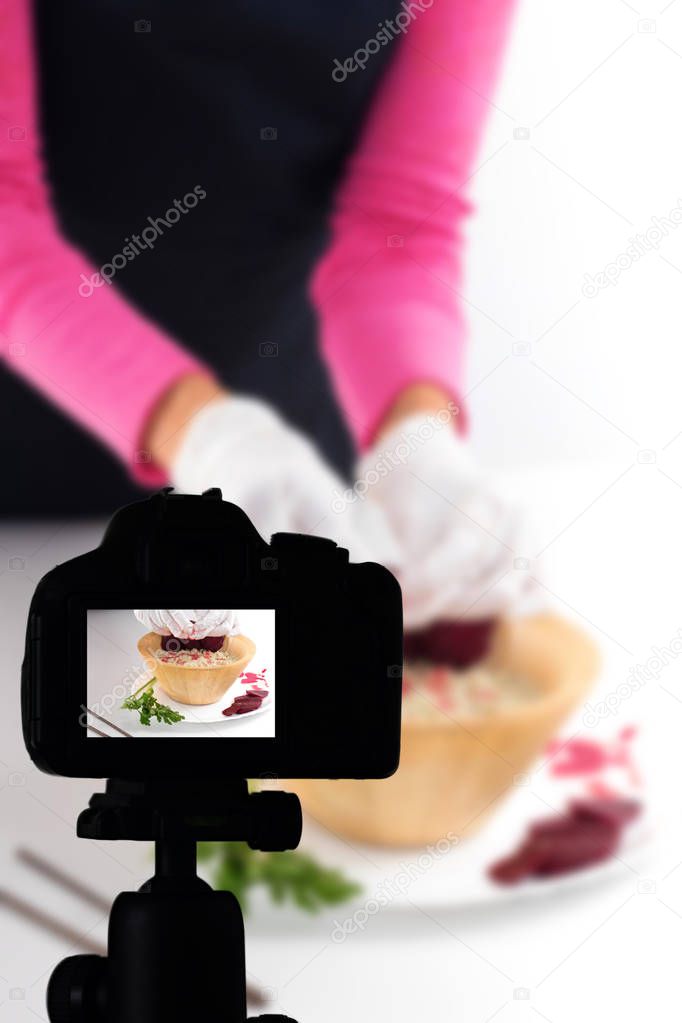 Young woman recording her video blog healthy food preparation, Food Blog concept