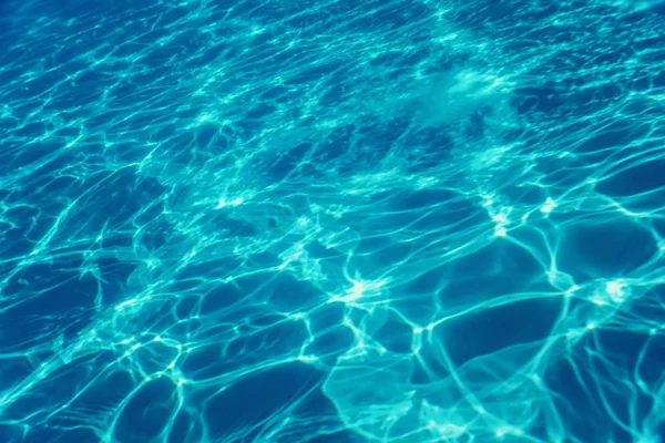 Swimming pool water sun reflection background. Ripple Water. — Stock Photo, Image