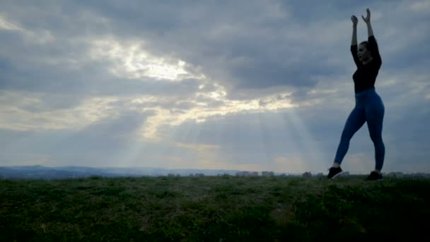 Young Woman Doing Cartwheel Grass Slow Motion Silhouette Sunset — Stock Video