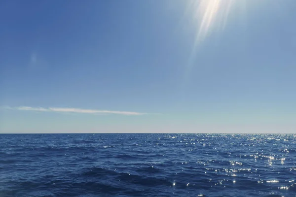 Blue Ocean, Water Surface a Blue Sky — Stock fotografie