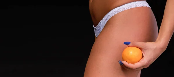 Junge Frau schönen Körper mit orange, Cellulite-Konzept, li — Stockfoto