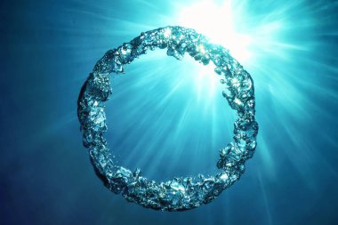 Bubble Ring Underwater ascends towards the Sun. clipart