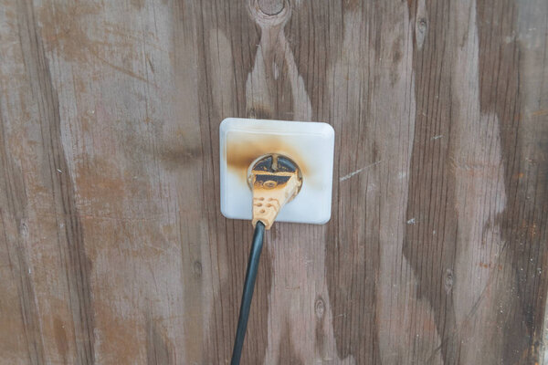 socket and wire in fire and smoke, fire