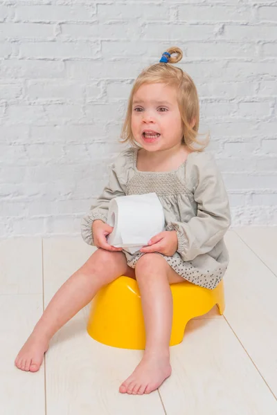 Girl Dress Child Sitting Yellow Pot Toilet Paper His Hands — Stock Photo, Image