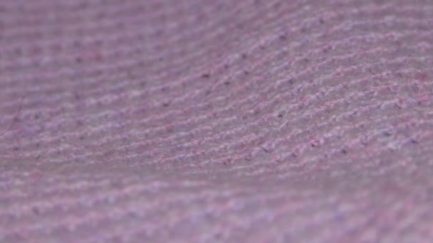 Une texture de coutures de boucles de tissu fermer — Video