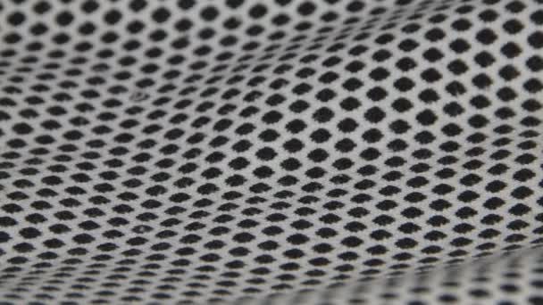 Uma textura de laços de tecido costura perto — Vídeo de Stock