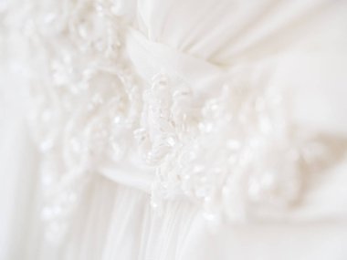 Gelinin elbise işlemeli öğeleri ve boncuk ile. Düğün töreni için gelin geleneksel sembolik Aksesuar.