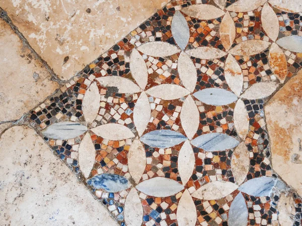 Ancient stone floor of the Church of St. Nicholas. Ancient authentic mosaic on the floor inFamous religious landmark in Demre, Turkey.