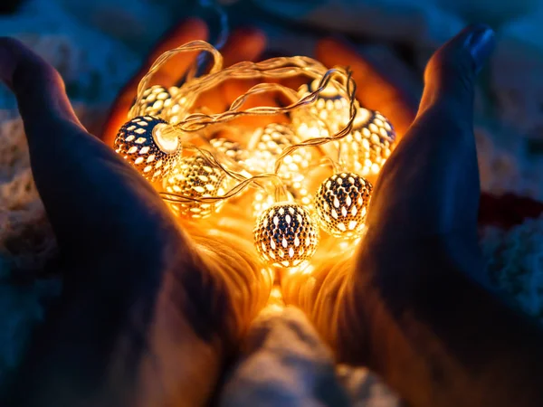 Hands Full Decorative Light Bulbs Christmas New Year Dark Background — Stock Photo, Image