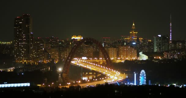 Night panorama view of Moscow, Russia. Architectural landmarks - Jivopisniy bridge, Stalin skyscraper, Ostankino Tower. — Stock Video