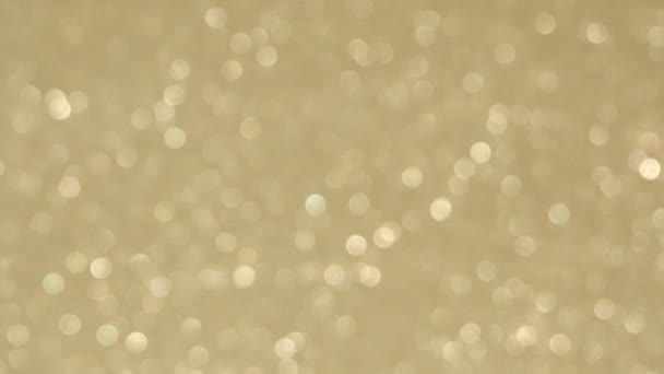 Luci d'oro sfocate, sfondo bokeh colorato sfocato. Vacanze lanterne colorate e ghirlande di lampadine — Video Stock