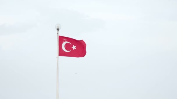 Flag of Turkey waving in the wind on outdoor lantern. Turkey. — Stock Video