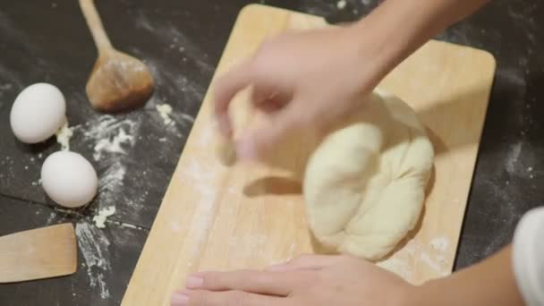 Cooking. Woman is making dough for dumplings. — Stock Video