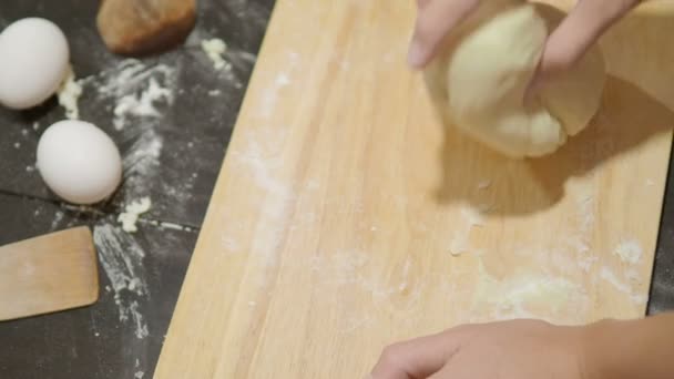 Cooking. Woman is making dough for dumplings. — Stock Video