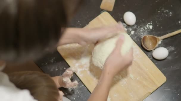 Cooking with children. Mother and son are making dumplings. — Stock Video