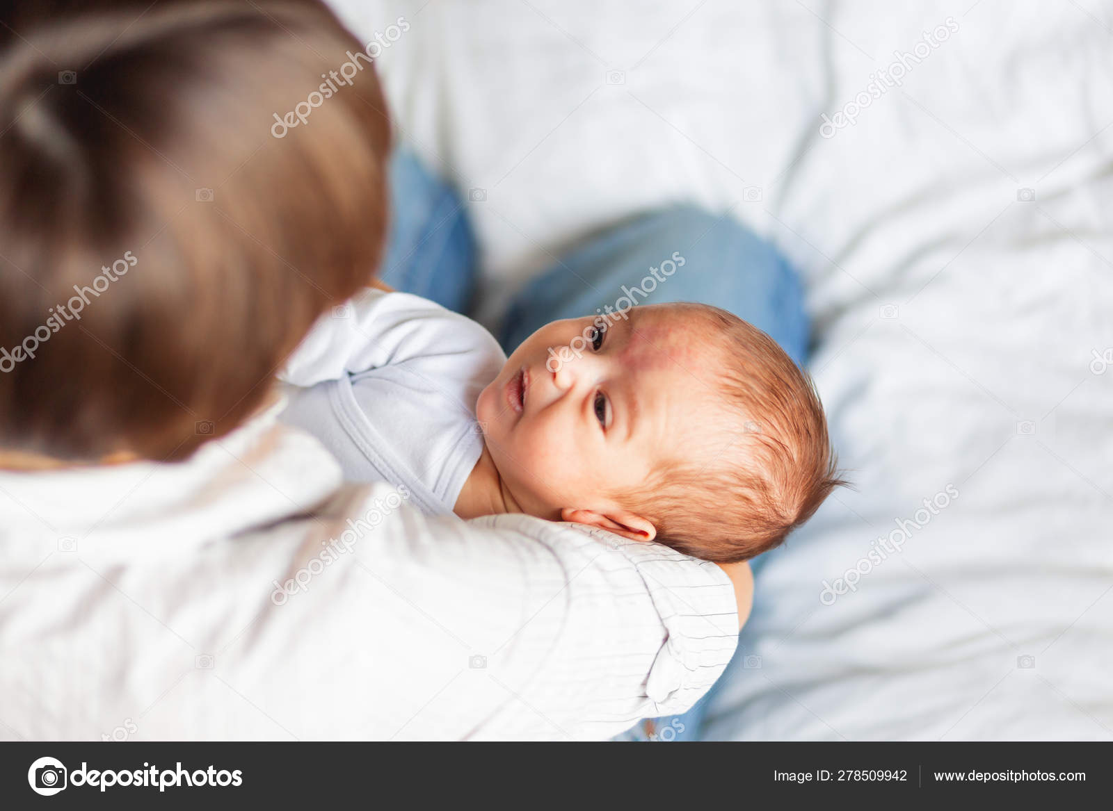 Woman Holding Her Child Mother Comforts Her Little Son Or