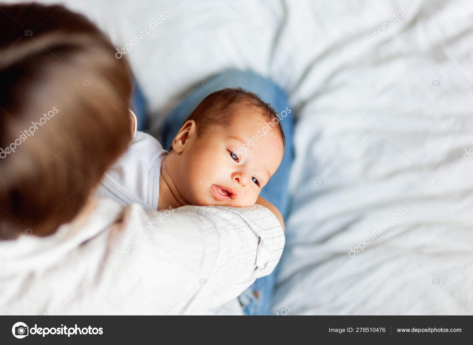 Woman Holding Her Child Mother Comforts Her Little Son Or