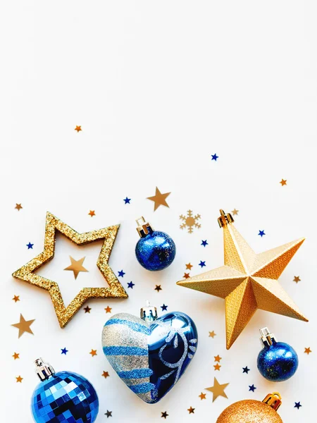 Christmas and New Year 2020 background with decorations, shaped as a circle. Golden and blue balls, stars, confetti and heart. — Stock Photo, Image