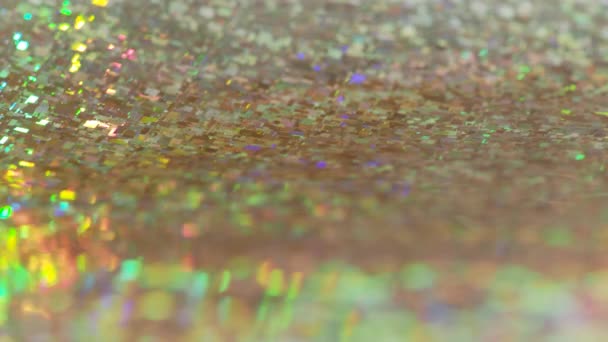 Heldere oranje achtergrond. Glanzende en sprankelende holografische regenboog achtergrond. — Stockvideo