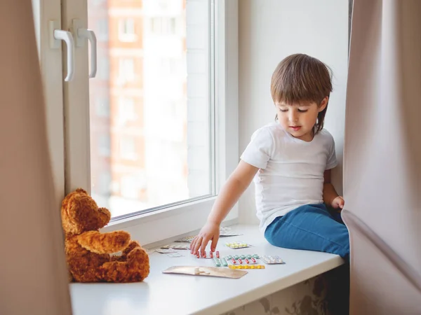 Toddler Sits Windowsill Plays Scattering Pills Parent Control Dangerous Situation — Stock Photo, Image