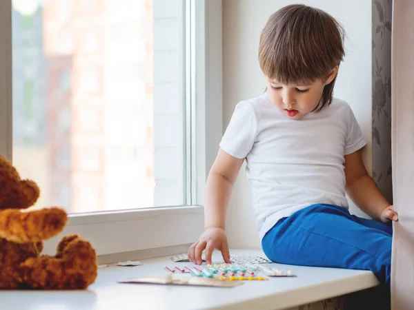 Toddler Sits Windowsill Plays Scattering Pills Parent Control Dangerous Situation — Stock Photo, Image